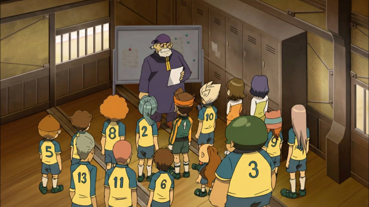 Illustration des joueurs de Raimon devant leur entraîneur